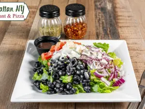 House salad with tomatoes, red onions, olives, and parmesan
